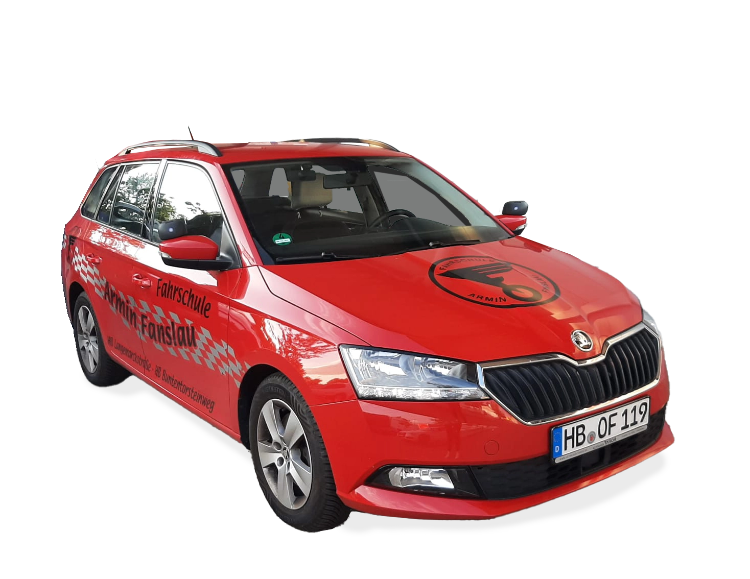 Ein rotes Auto mit der Aufschrift Fahrschule Armin Fanslau